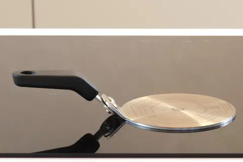 Adaptateur pour plaque à induction. Permet de savoir si l'on peut utiliser une casserole induction sur plaque électrique.